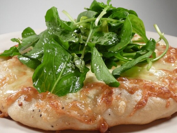 white pizza with arugula white pizza with arugula